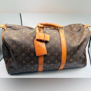 Louis Vuitton Keepall Bandouliere 45
 1985 with Dust Bag, Lock & Key and COA